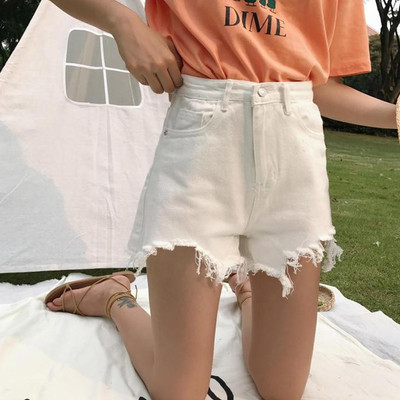 Πολύ μοντέρνο και άνετο κυρίες σύντομη παντελόνι τζιν σε μαύρο και άσπρο με κρόσσια στα πόδια