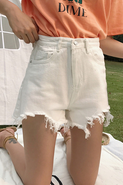 Πολύ μοντέρνο και άνετο κυρίες σύντομη παντελόνι τζιν σε μαύρο και άσπρο με κρόσσια στα πόδια