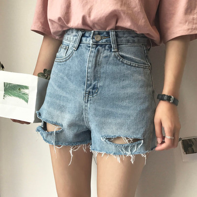 Hit κυρίες σύντομο παντελόνι denim με μια υψηλή μέση, σχισμένο κίνητρα και βλεφαρίδες στα άκρα των σκελών