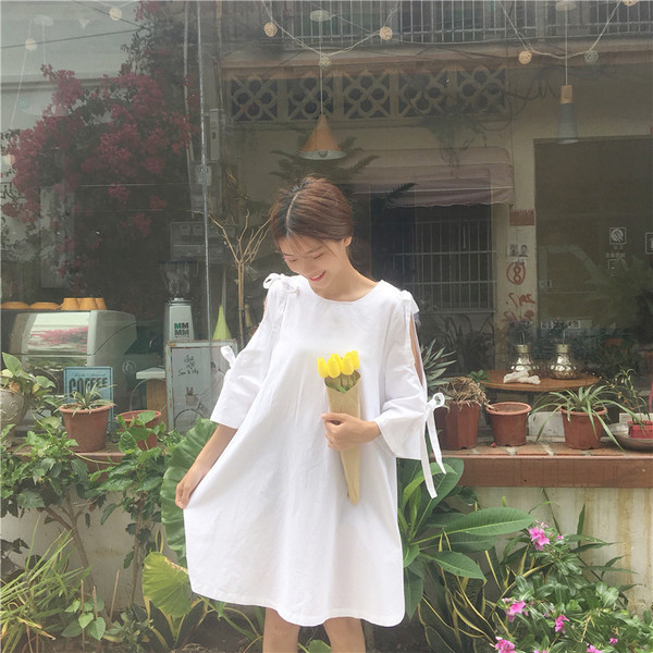 Πολύ κομψή  μακρύ μπλούζα τύπου πουκάμισο με γυμνά στοιχεία μανίκι