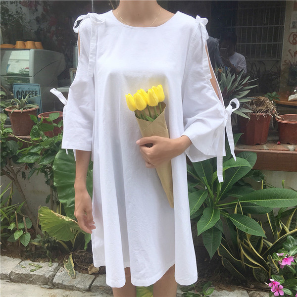 Πολύ κομψή  μακρύ μπλούζα τύπου πουκάμισο με γυμνά στοιχεία μανίκι