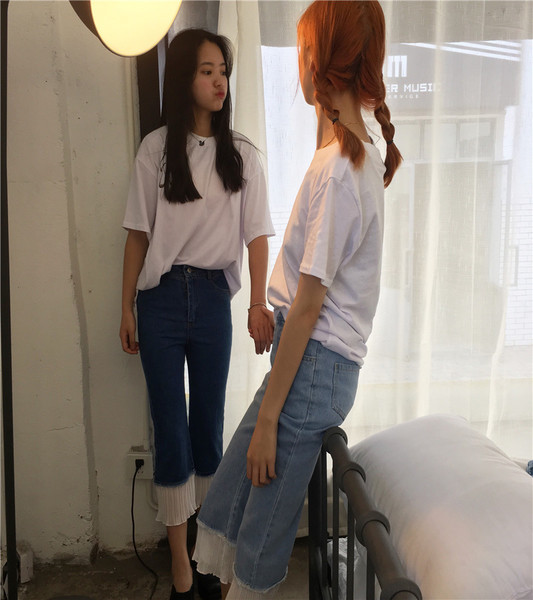 Καθημερινά παντελόνια denim με 7/8 πόδι και πολύ ενδιαφέρουσα δαντέλα