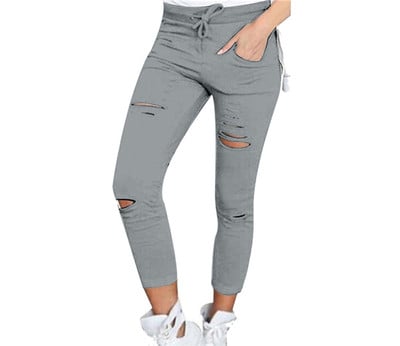 Много удобен дамски ежедневен панталон с разкъсани мотиви