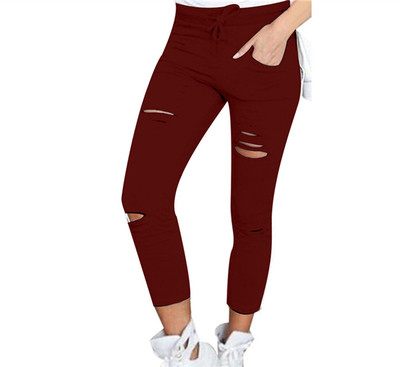 Много удобен дамски ежедневен панталон с разкъсани мотиви