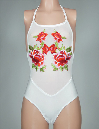 Πολύ κομψό και ενδιαφέρον κυρίες μαγιό με όμορφα κεντήματα με λουλούδια και διαφανή κίνητρα