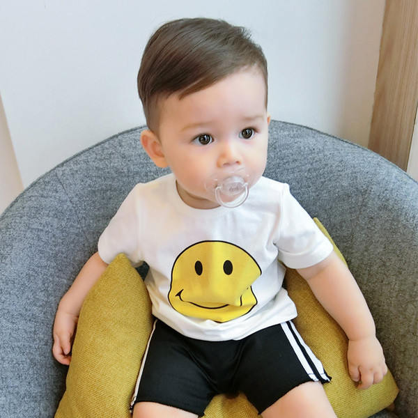 Παιδική λευκή μπλούζα με κοντό μανίκι και κολάρο σε σχήμα O με εικόνα