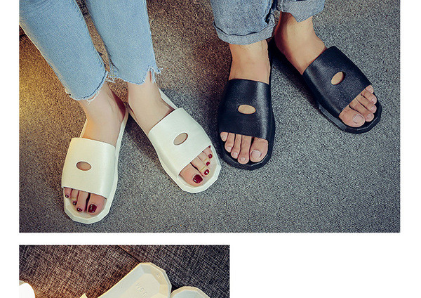 Καουτσούκ παντόφλες για τους άνδρες και τις γυναίκες σε μαύρο και άσπρο κατάλληλο για τη ζωή