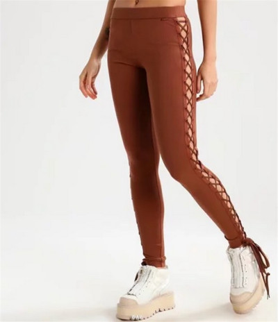  Γυναικεία αμφιλεγόμενη κομψά παντελόνια  με πολλά ενδιαφέροντα links και στις δύο πλευρές του ποδιού