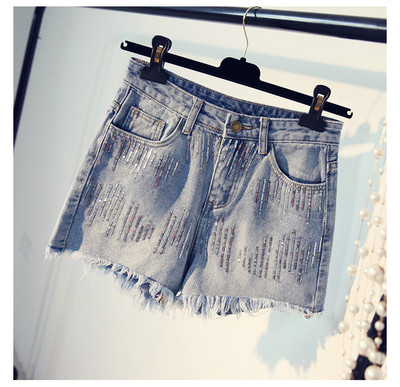 Γυναικεία σορτς με πούλιες σε μπλε και γκρι και ελαφρώς σχισμένες