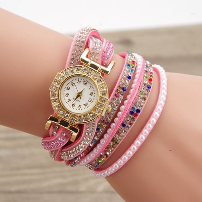 Πολύ ενδιαφέρουσα γυναικείο ρολόι τύπου βραχιόλι με λαμπερά, χρωματιστά βότσαλα για διακόσμηση