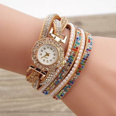 Πολύ ενδιαφέρουσα γυναικείο ρολόι τύπου βραχιόλι με λαμπερά, χρωματιστά βότσαλα για διακόσμηση