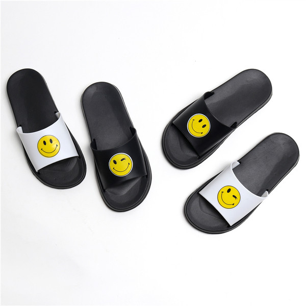 Unisex γυναικείες παντόφλες από καουτσούκ σε μαύρο και άσπρο χρώμα