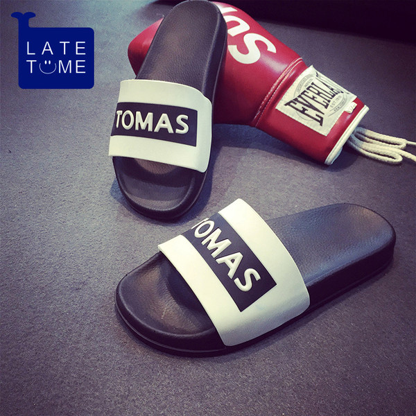 Καουτσούκ παντόφλες σε μαύρο και άσπρο - unisex