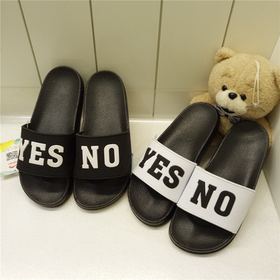 Модерни гумени чехли унисекс в бял и черен цвят, с надпис "Yes/No" 