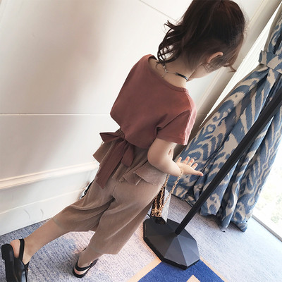 Интересен модел дамска блуза с панделка на гърба в два цвята