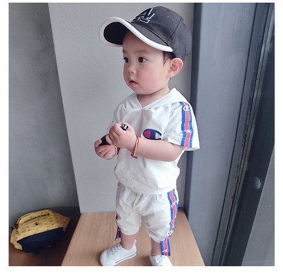 Αθλητικό σετ για αγόρια σε μαύρο και άσπρο - κοντά μανίκια και παντελόνια