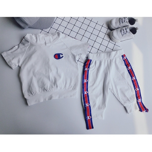 Αθλητικό σετ για αγόρια σε μαύρο και άσπρο - κοντά μανίκια και παντελόνια