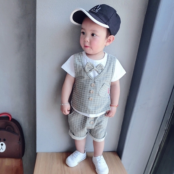 Κομψό παιδικό σετ για αγόρια δύο τεμαχίων σε ροζ και πράσινο χρώμα