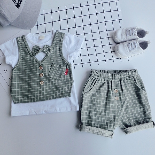 Κομψό παιδικό σετ για αγόρια δύο τεμαχίων σε ροζ και πράσινο χρώμα