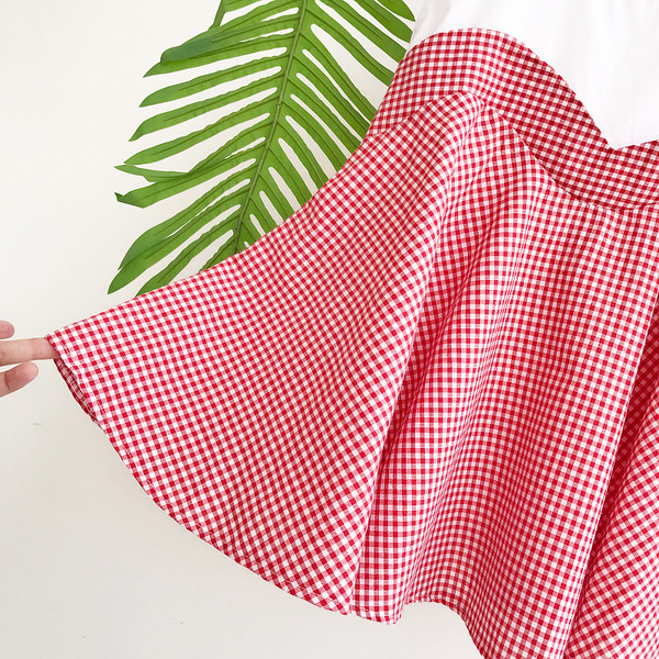 Ευρεία Οι γυναίκες στην αρχή της ασφαλείας σε πράσινο, μαύρο και κόκκινο