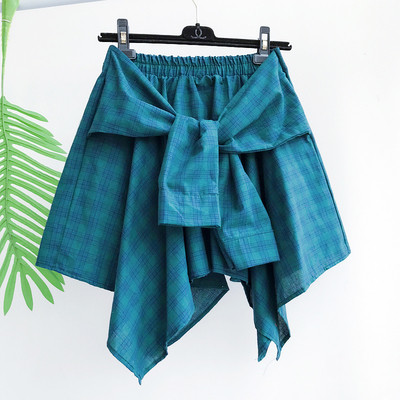 Κομψό κυρίες φούστα καρό δέσιμο μέρος