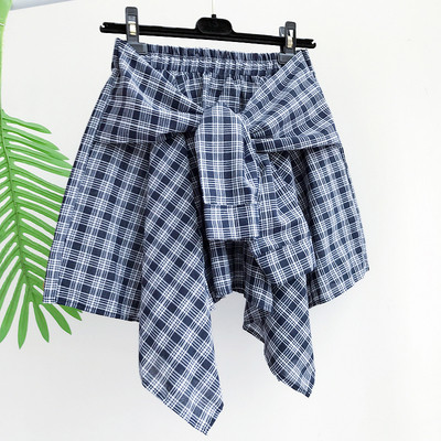 Κομψό κυρίες φούστα καρό δέσιμο μέρος