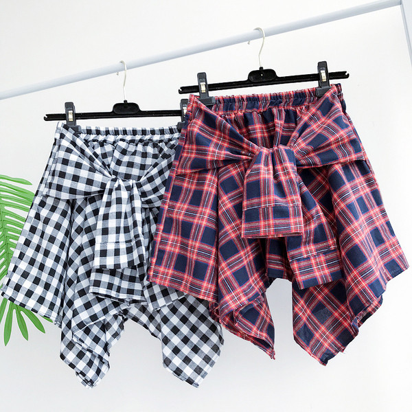 Κομψό κυρίες φούστα καρό δέσιμο μέρος