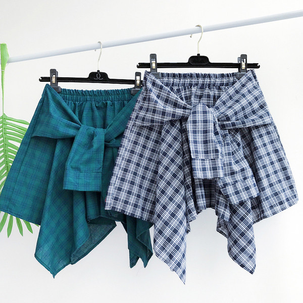 Κομψό κυρίες φούστα καρό δέσιμο μέρος