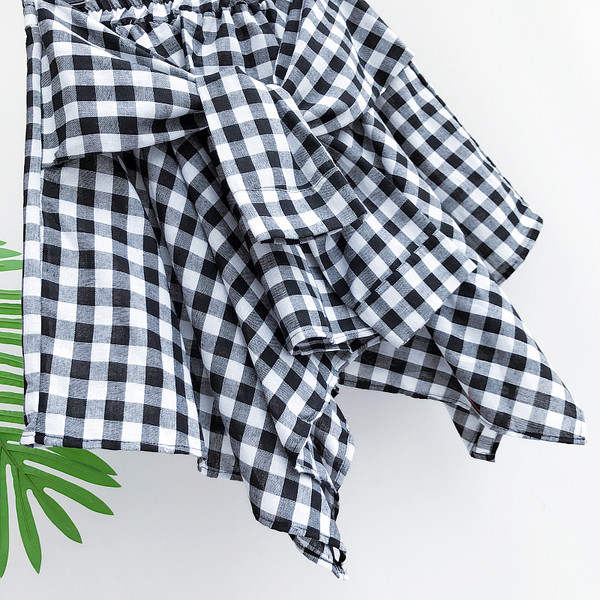 Κομψό κυρίες φούστα καρό δέσιμο μέρος