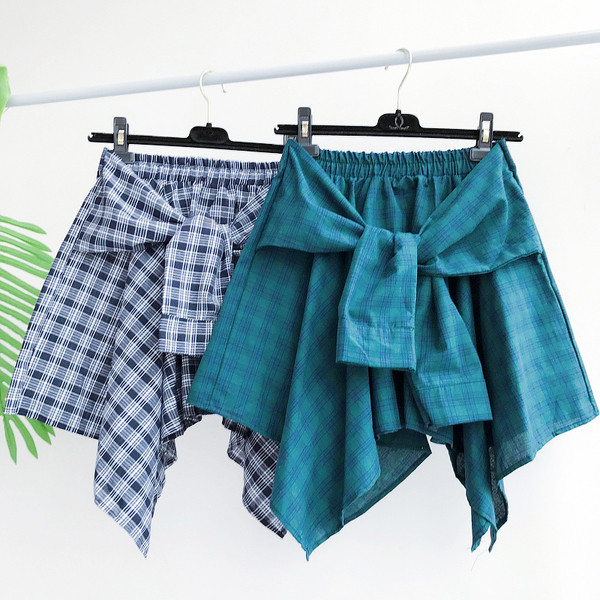 Κομψό κυρίες φούστα καρό δέσιμο μέρος