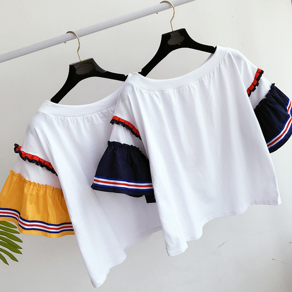 Μια ενδιαφέρουσα κυρίες μοτίβο μπλούζα με 3/4 μανίκια χρώματος σγουρά