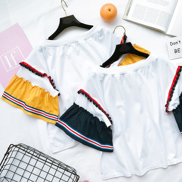 Μια ενδιαφέρουσα κυρίες μοτίβο μπλούζα με 3/4 μανίκια χρώματος σγουρά