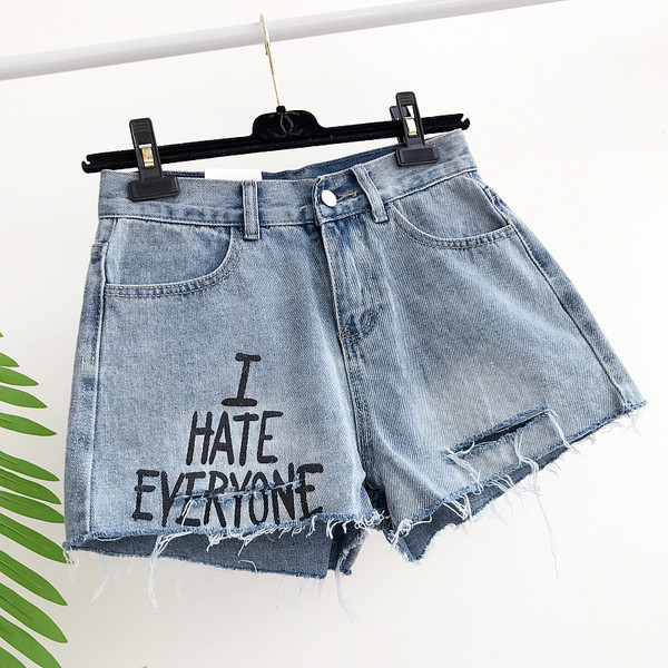 Σύγχρονη κυρίες παντελόνι σύντομο τζιν επισημαίνονται