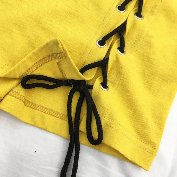 Φρέσκα κυρίες μπλούζα με δεσμούς σε μαύρο, λευκό και κίτρινο