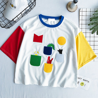 Αθλητικά κυρίες T-shirt σε μαύρο και λευκό με χρωματιστές μανίκια