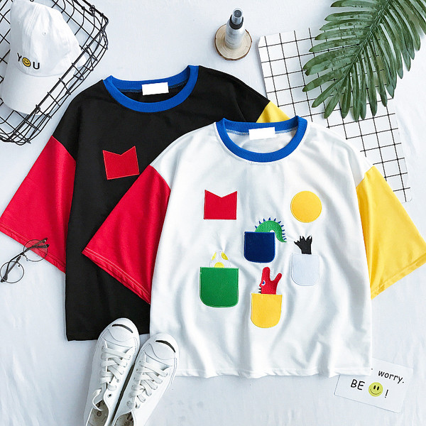 Αθλητικά κυρίες T-shirt σε μαύρο και λευκό με χρωματιστές μανίκια