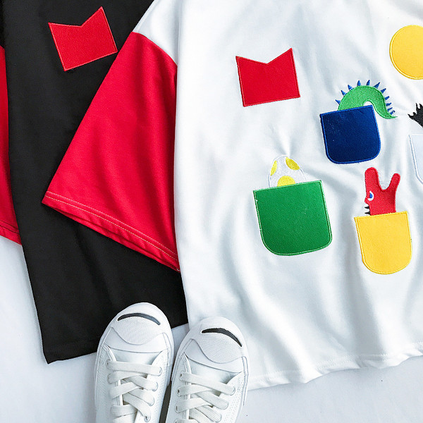 Αθλητικά κυρίες T-shirt σε μαύρο και λευκό με χρωματιστές μανίκια