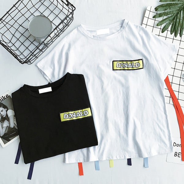 μπλούζα Κομψή κυρίες μαύρο και άσπρο με το χρώμα δεσμούς