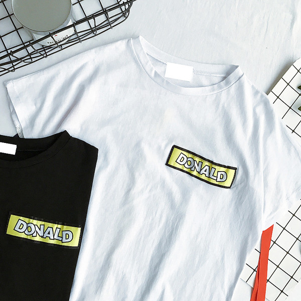 μπλούζα Κομψή κυρίες μαύρο και άσπρο με το χρώμα δεσμούς