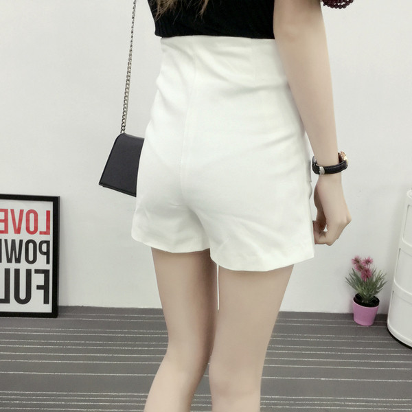 Стилна пролетно-лятна асиметрична пола в бял и черен цвят