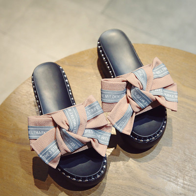 Μοντέρνες γυναικείες παντόφλες με μεγάλη πλατφόρμα και κορδέλα σε διάφορα χρώματα