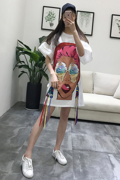 Όμορφο γυναικείο μπλουζοφόρεμα   με μεγάλη εφαρμογή και  κρόσσια