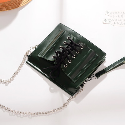 Стилна дамска чанта в четири цвята с метална дръжка и с връзки