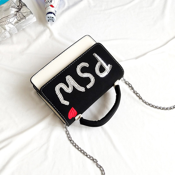 Ежедневна дамска чанта с метална дръжка и с декорация пайети