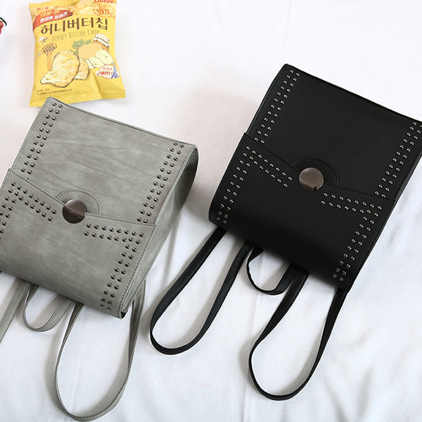 Κομψό σακίδιο με μεταλλική διακόσμηση σε τέσσερα χρώματα