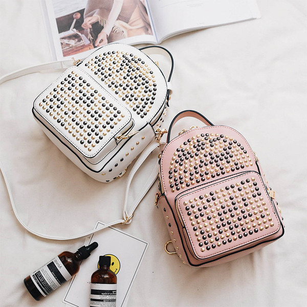 Όμορφο γυναικείο σακίδιο με τετράχρωμη διακόσμηση με χάντρες