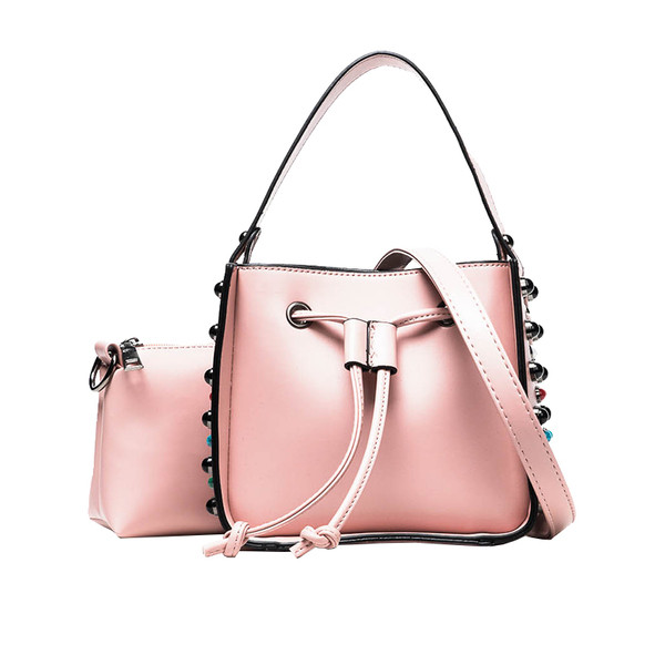 Дамска чанта за дамите с метална декорация в три цвята