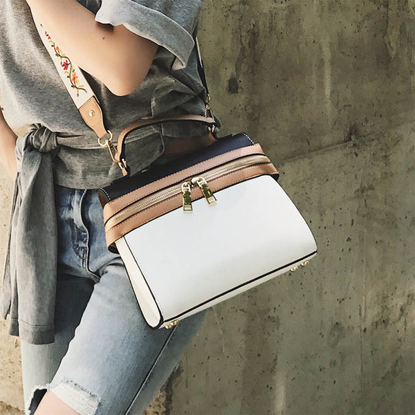 Модерна дамска чанта в два цвята с широка дръжка с бродерия