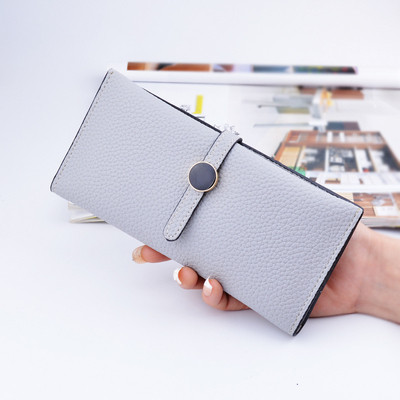 Красив дамски портфейл с копче в много цветове