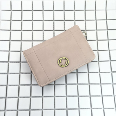 Красиво дамско портмоне в шест цвята с малка метална декорация